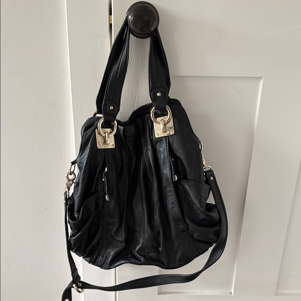 Junior Drake Black and Gold Shoulder Bag with Slouchy Design
